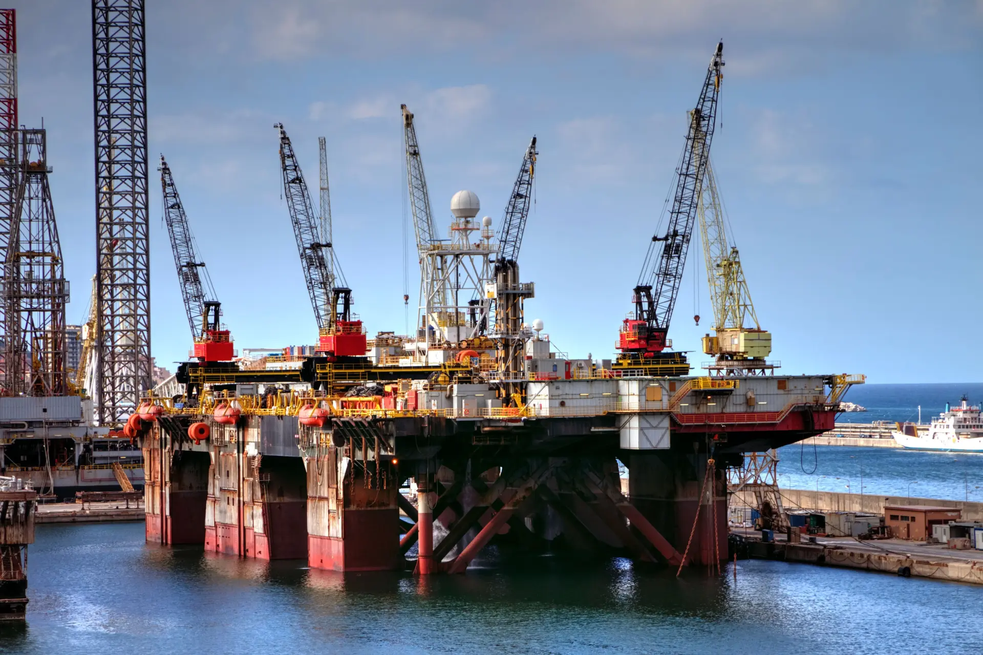 Offshore oil rig at sunset